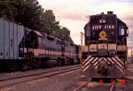 SOU 3169 in the service area as another train rolls by